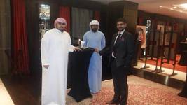 Pir Shafi Muhammad (right) with Muhammad Kamal (left) and Mr. Hassan of the Emirates Red Crescent